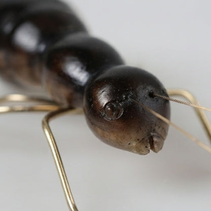 Golden-Footed Black Ant Figurine